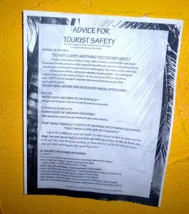 Travel Advisory On Bathroom Wall