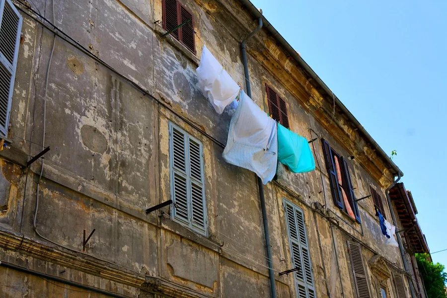 Sheets hanging from a window in the back streets of Bagnaia, in Viterbo Italy